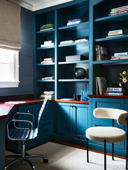 Navy blue home office setup for work-from-home virtual design assistance, one of the interior designer costs services offered.