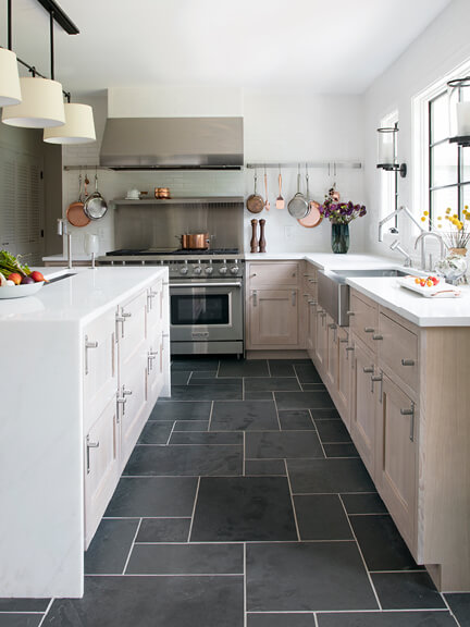 Natural New England slate tile in varying shapes and sizes, featured in a traditional kitchen design in Westwood, Massachusetts.