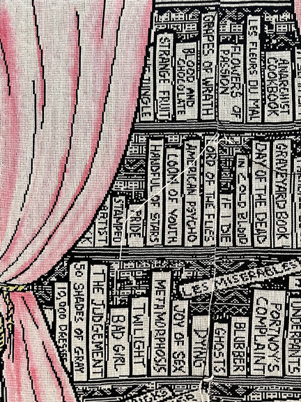 Knitted artwork by Lisa Anne Auerbach titled Illicit Library, shown at the Hearst Gallery for emerging artists in NYC.