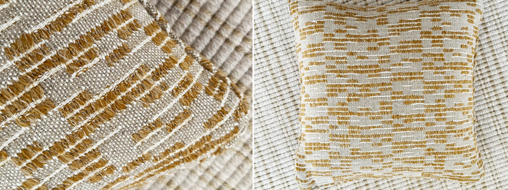 Custom pillow in Zak + Fox Sayat fabric featuring soft yellow and beige woven textures, styled for a dining room bench.