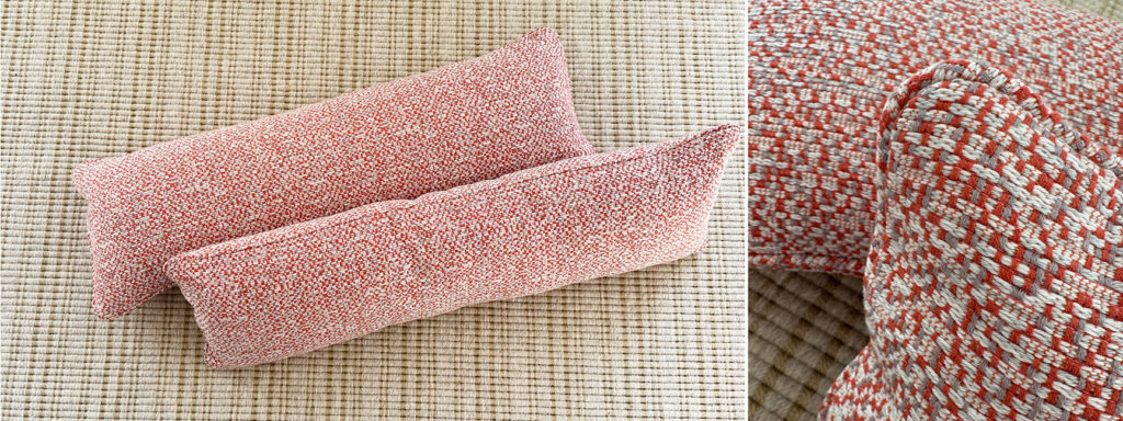 Custom bed pillows in Pierre Frey Socoa fabric (Praline), a durable, kid-friendly acrylic textile woven in pink-red tones.