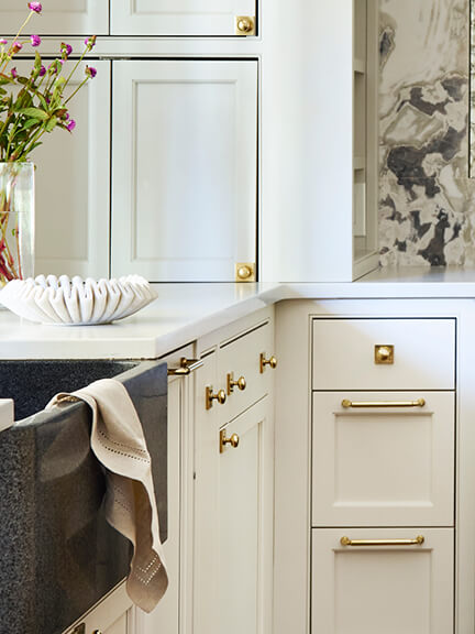 Hand-finished brass hardware from Classic Brass, crafted in Connecticut, a New England-made detail for your kitchen.