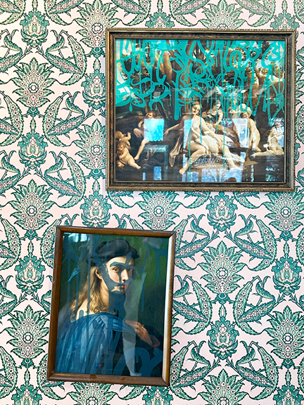 Perfectly imperfect green and pink floral wallpaper with graffiti-style artwork over old-world fine art at Maison Pepin in Montreal.