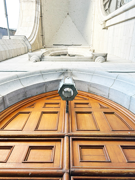 Visit Montreal in the Winter to see the grand wooden doors, soaring stone arches, and aged metal light fixture at Notre-Dame Basilica.