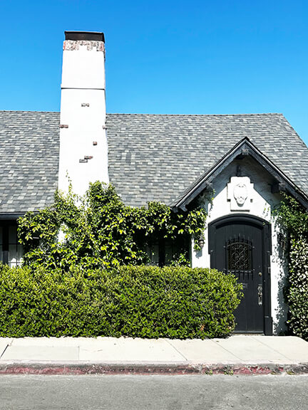 1920s historic home on Glendower Avenue in Los Feliz with pastel stucco and curved forms, showcasing early LA historic home design.