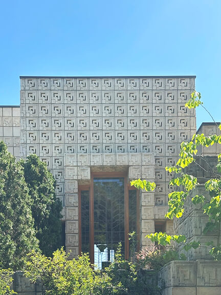 Frank Lloyd Wright’s textile block house in LA, featuring patterned concrete blocks and a dramatic take on historic interior design.