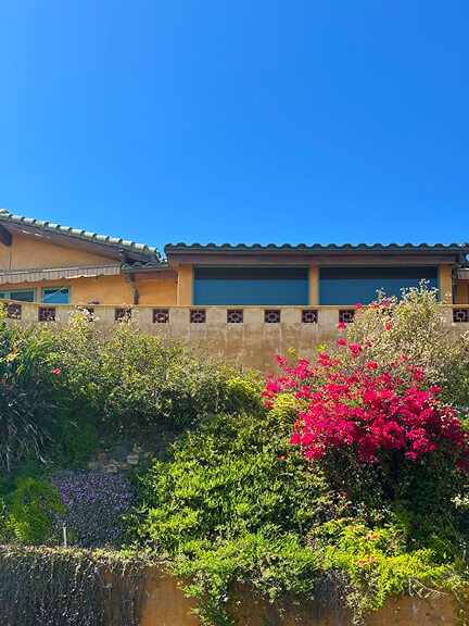 Yellow stucco Spanish Colonial Revival on Catalina Street in Los Feliz, a sunny take on historic home design in Southern California.