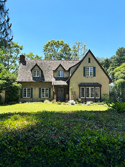 Storybook English Revival home in California with steep rooflines and charming asymmetry—an expressive take on historic home design.