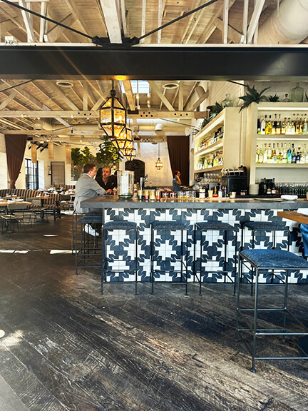 Gracias Madre in West Hollywood features bold black and white concrete tile. A must-see in Los Angeles Shopping and Dining.