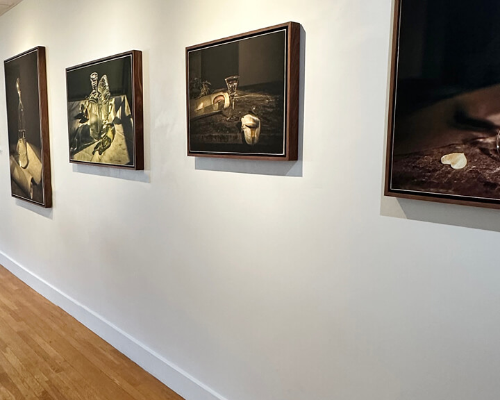 Gallery walls at South Shore Art Center featuring Curtis Speer’s work, highlighted by a south shore interior designer