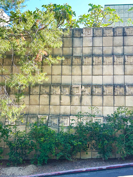 Frank Lloyd Wright’s Ennis House in Los Feliz, with concrete textile blocks, landscape walls, and historic architectural elements