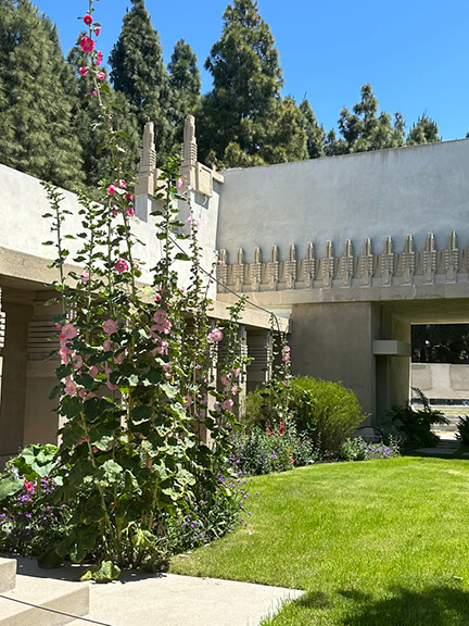 Mayan Revival concrete home with courtyards and landscape design, featured on a postmodern architecture Los Angeles tour