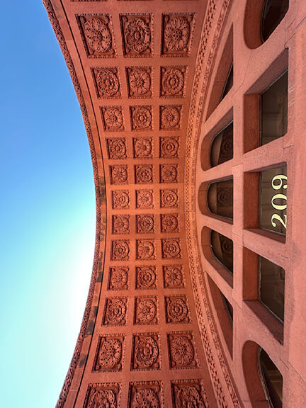 Youth’s Companion Building in Boston with Romanesque brickwork, tied to the Pledge of Allegiance and historic home design in Boston.