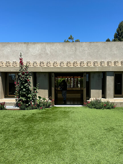 Mayan Revival architecture by Frank Lloyd Wright at Hollyhock House, part of postmodern architecture Los Angeles tour