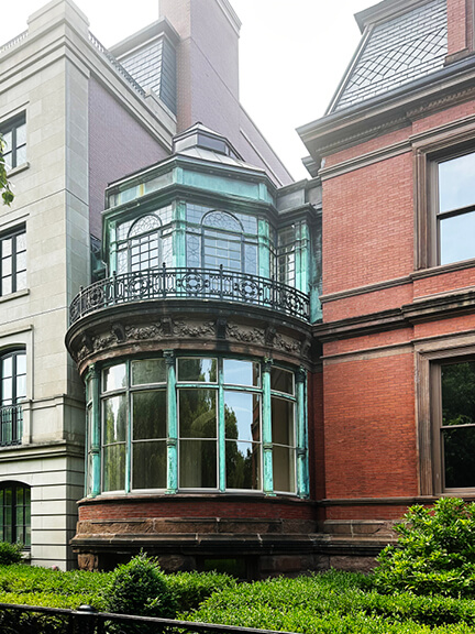Ames-Webster Mansion in Boston’s Back Bay with French-style detailing and brickwork, reflecting historic home design in Boston.