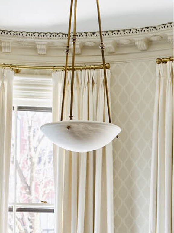 Boston brownstone renovation with onyx disc light, a classic traditional choice from design development in interior design