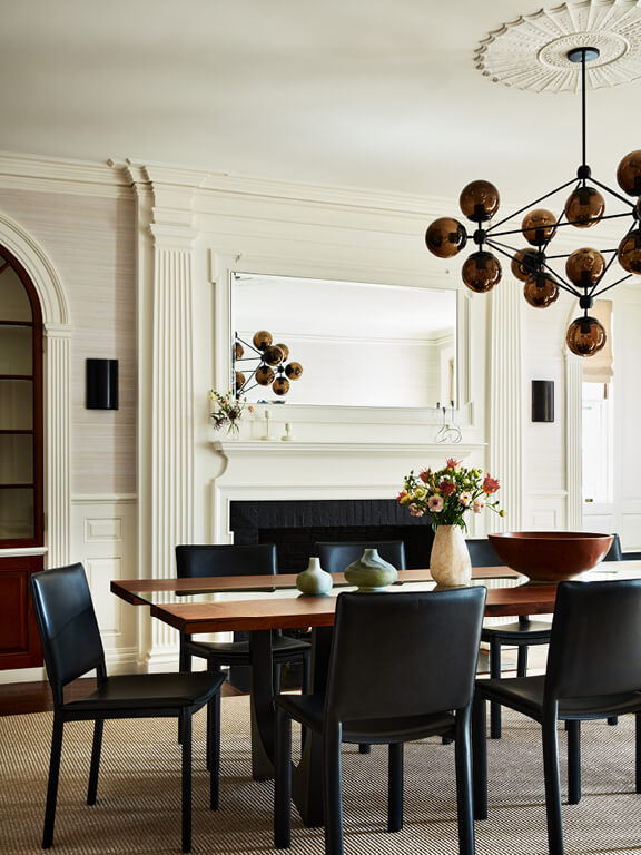 Historic Boston family room with original millwork and furnishings, a result of existing conditions and schematic design services
