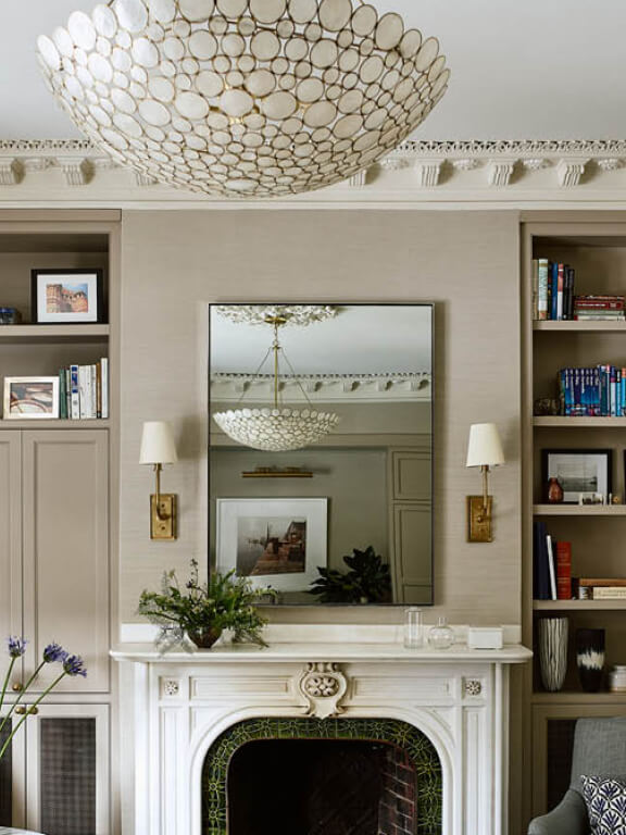 Oly Studio chandelier brass and glass at historic home design project Boston brownstone renovation highlighting custom lighting in design development.