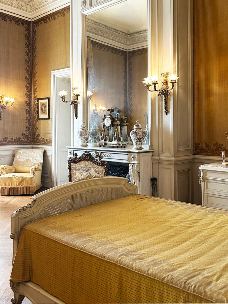 Antique furniture in a historic bedroom at The Elms in Newport, Rhode Island, featuring elegant detailing and timeless craftsmanship.