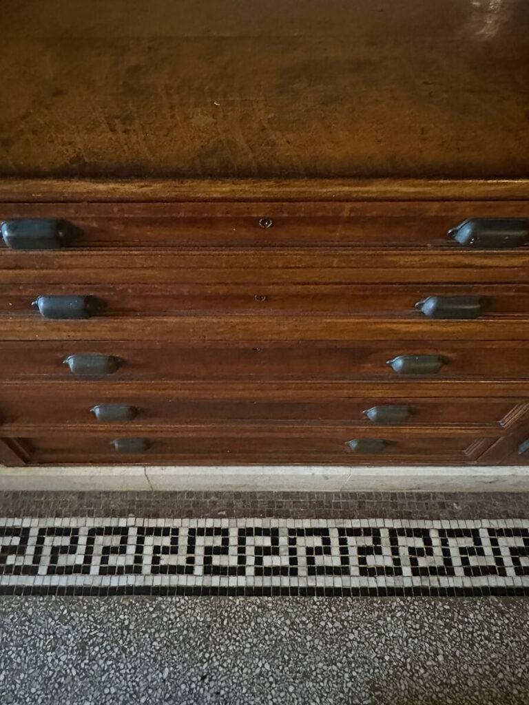 Greek fret tile and terrazzo flooring in the basement kitchen at The Elms, an enduring detail of Gilded Age Interior Design.