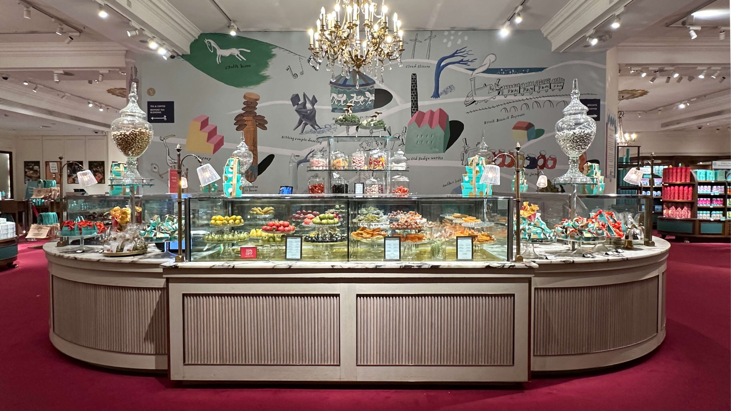 Interior of Fortnum & Mason London, filled with heritage color and design, featured in Eat Sleep Shop London.