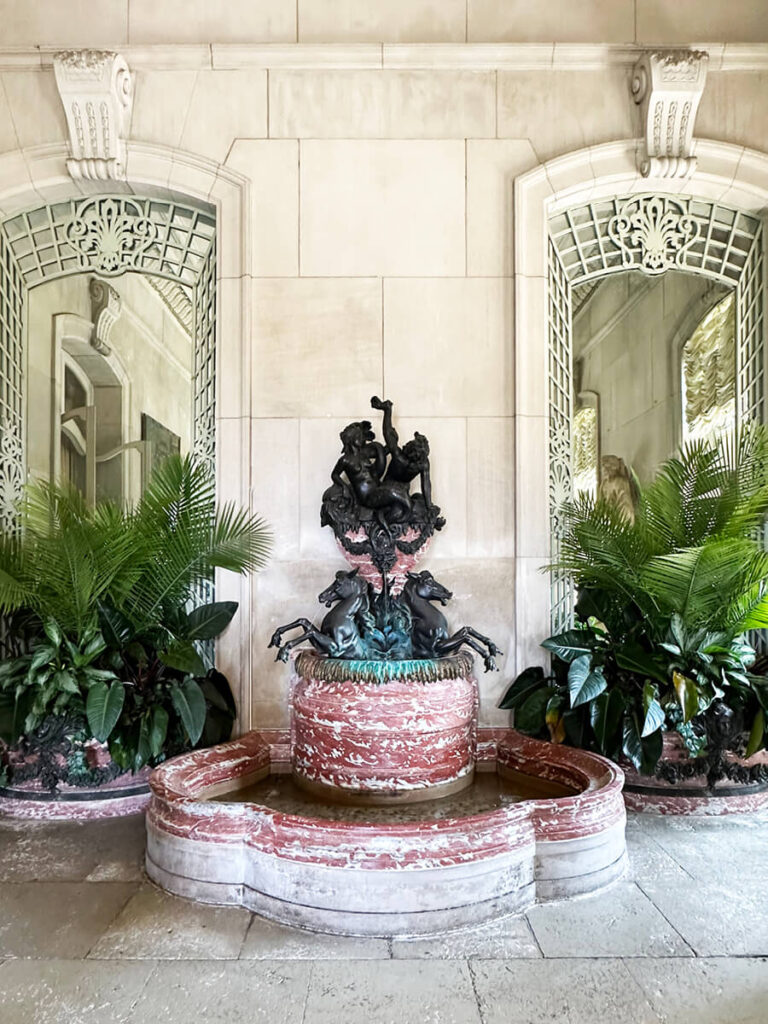 Marble fountain in the sunroom at The Elms in Newport, an elegant showcase of Gilded Age Interior Design and craftsmanship.
