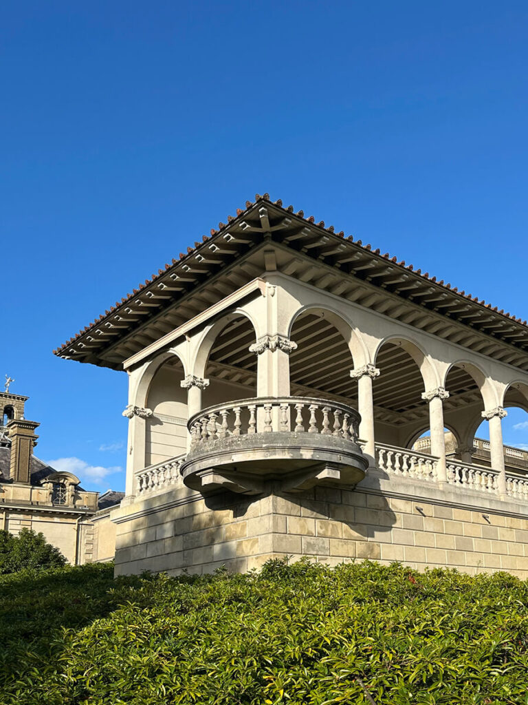 Historic English Estate Design displayed in the grand country house facade of Cliveden, featuring limestone walls and arched windows.