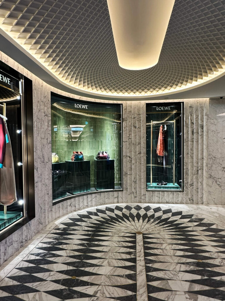 Marble floor pattern at Harrods showcasing craftsmanship and symmetry in design.