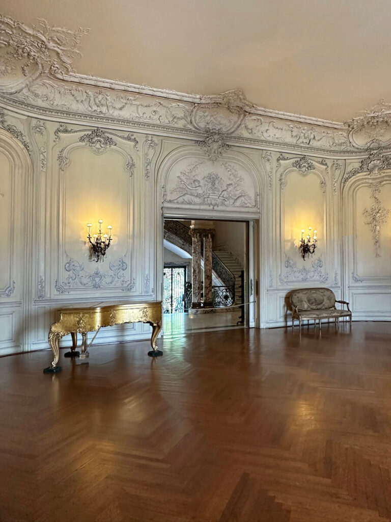 Herringbone floor and marble accents at The Elms in Newport, a timeless feature of Gilded Age Interior Design.