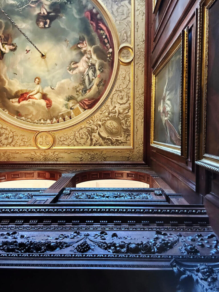 Cliveden House interior showcasing rich woodwork and symmetry, hallmarks of English manor interior design.