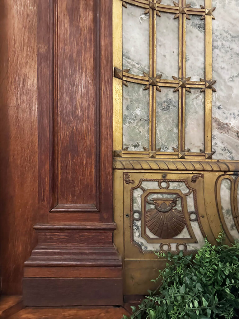 Wood, brass, and marble design details in a historic home at The Elms, fine examples of Gilded Age Interior Design craftsmanship.