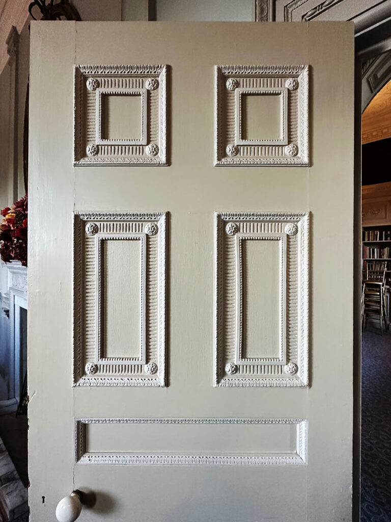 Historic interior door at Grade I listed Cliveden House, admired by a Boston interior designer for its craftsmanship.