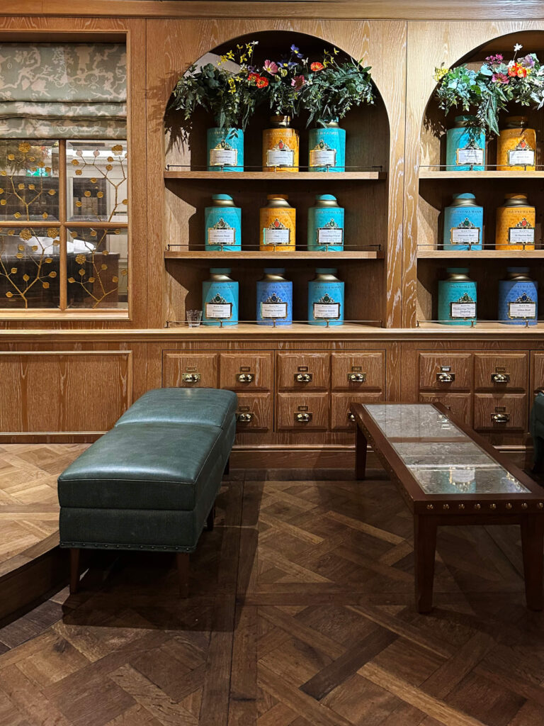 Inside Fortnum & Mason London lobby showing tea merchandising displays and classic interior detailing.