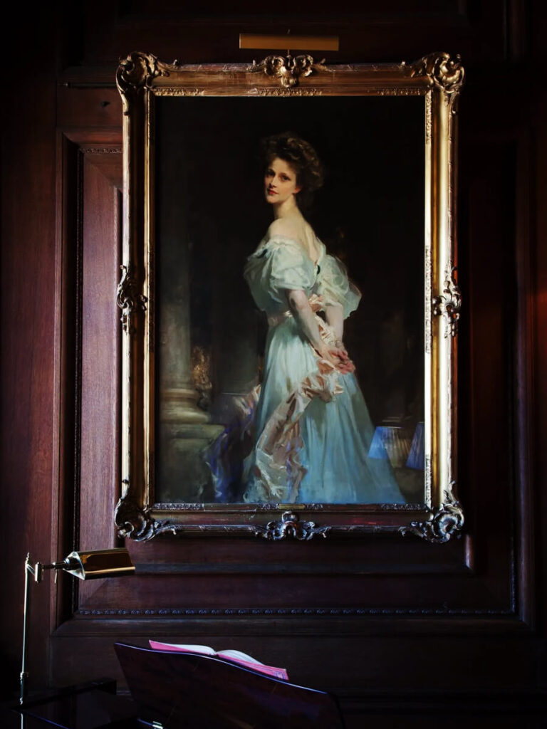 John Singer Sargent portrait of Nancy Astor at Cliveden House, surrounded by English manor interior design.