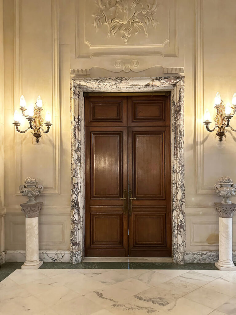 Marble door trim in a historic home at The Elms in Newport, Rhode Island, highlighting refined craftsmanship and period details.