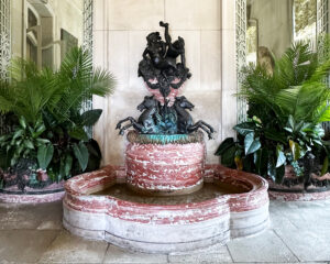 The Elms interior showing grand marble staircase and gilded details—an icon of Gilded Age interior design in Newport.