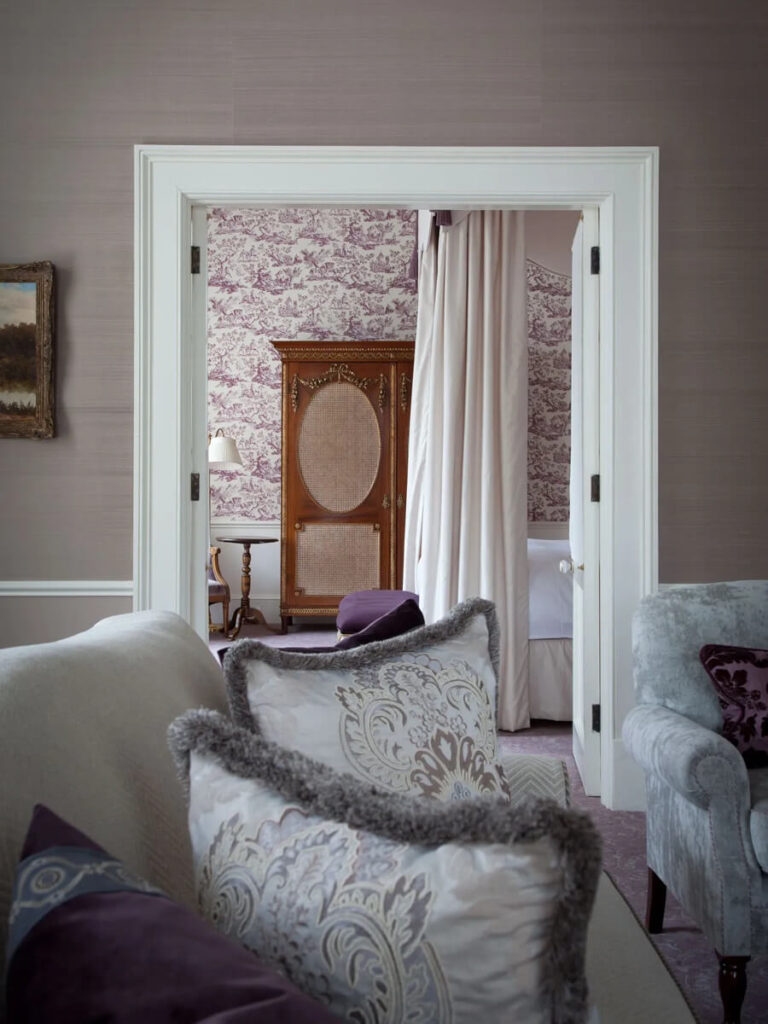 Traditional bedroom interior design at Cliveden House, an English countryside manor showcasing English manor interior design.