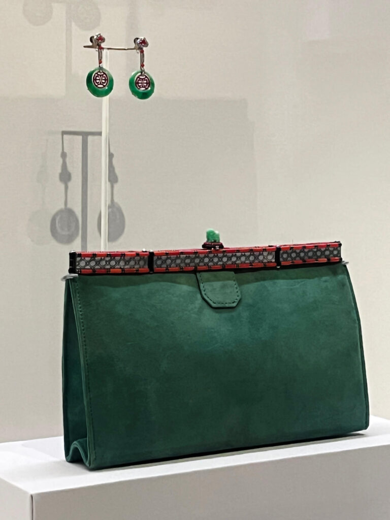 Cartier jade and coral Art Deco pendants with platinum and enamel shown in the Cartier Jewelry Exhibit.