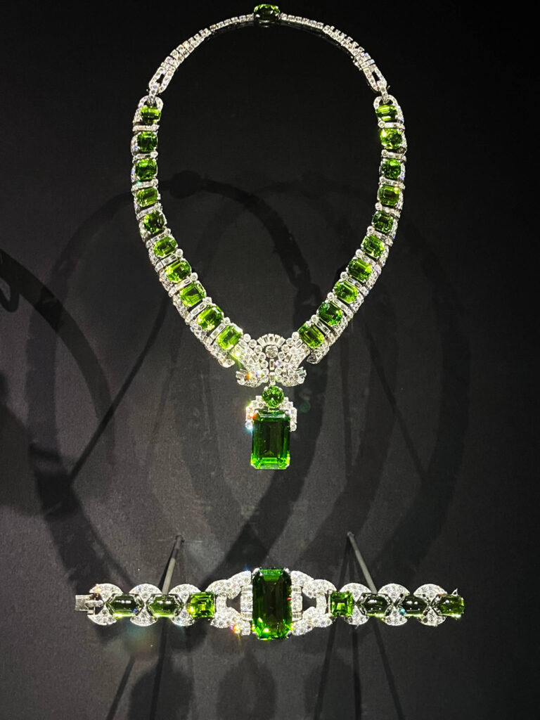 A Cartier peridot necklace and bracelet set with diamonds created for Chester Beatty.