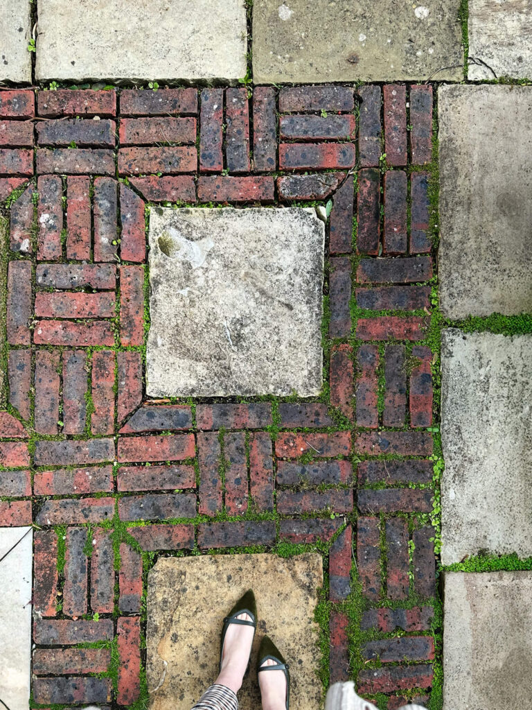 The Cosmic House London garden brick and stonework showing classic London architecture in Holland Park with traditional materials