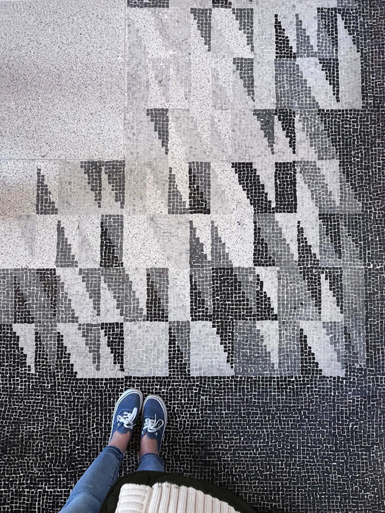 Modern mosaic tiles line a new corridor inside the Victoria and Albert Museum in London, blending contemporary design with the historic building.