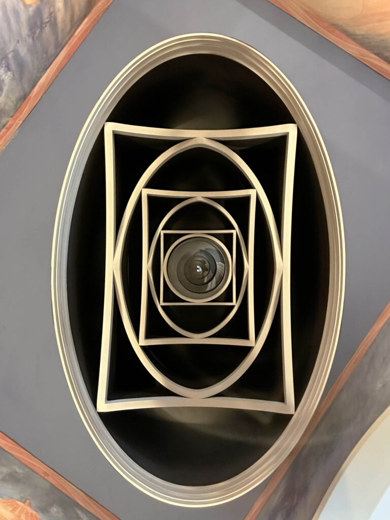 The Cosmic House London unique ceiling design with oval and geometric concentric shapes at the entry in Holland Park