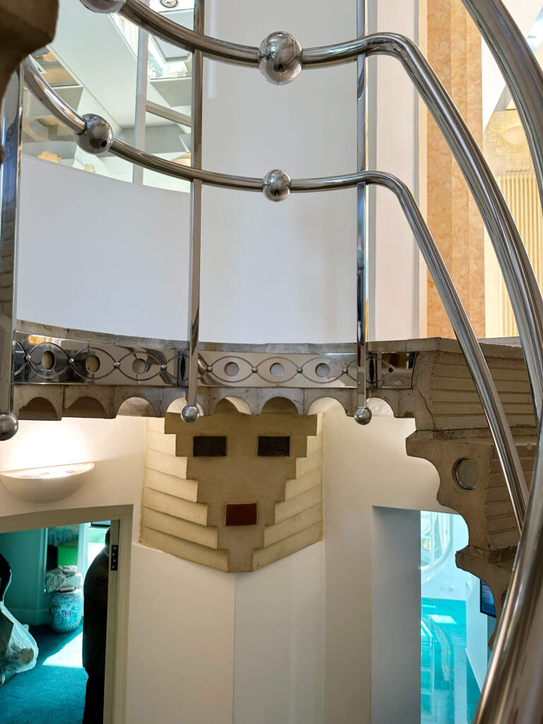 Stair rail, treads, and risers with unique architectural detailing in a London home