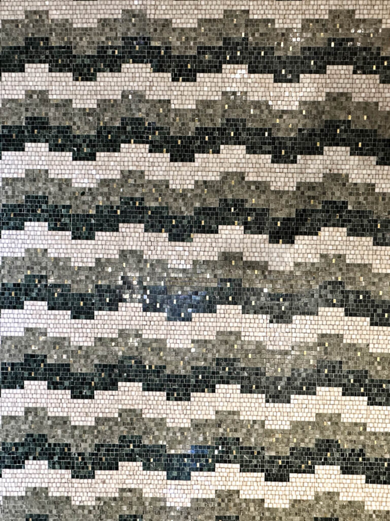 Cartier Mansion New York geometric mosaic tile flooring within a luxury retail interior
