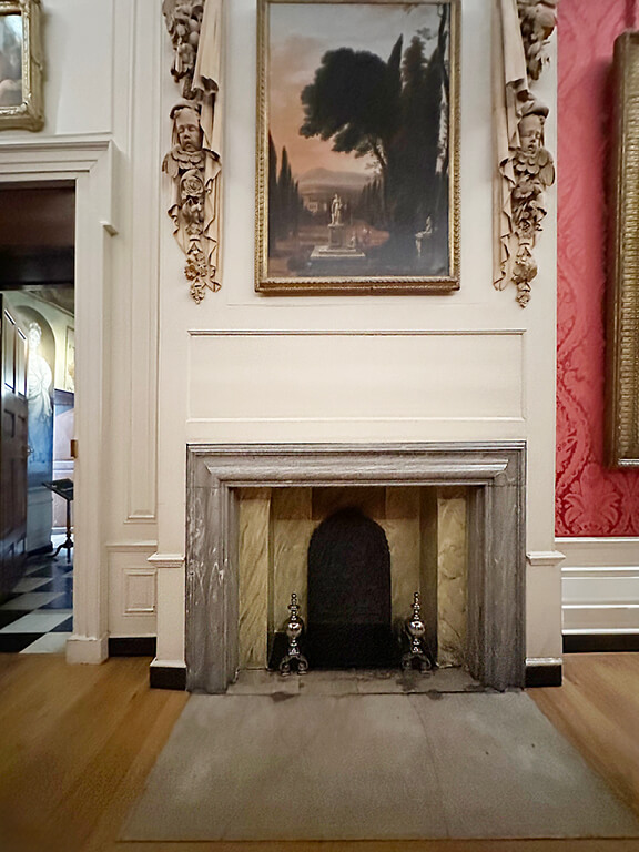 Historic fireplace design anchoring a formal room in the King’s Apartments at Kensington Palace.