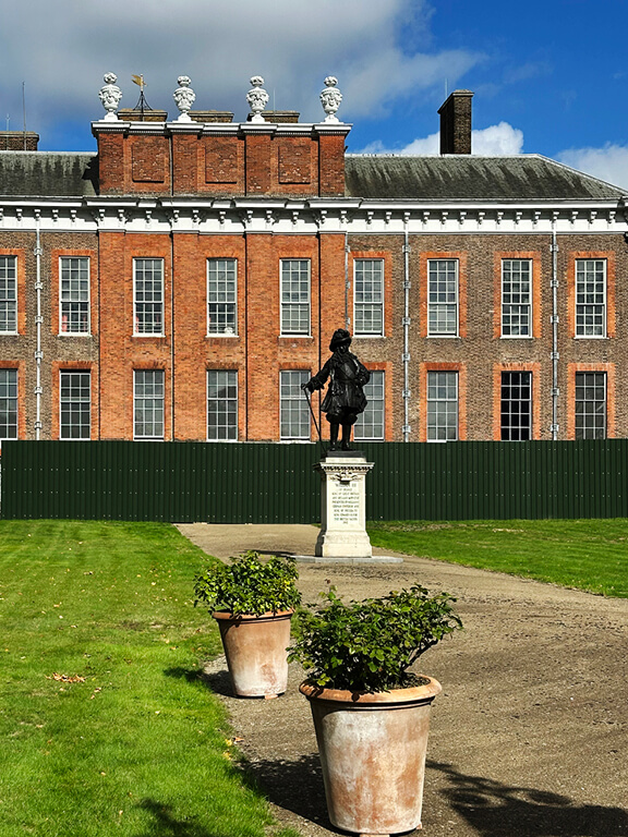 Kensington Palace Interiors contrasted with the palace exterior, highlighting Georgian brickwork and formal proportions.