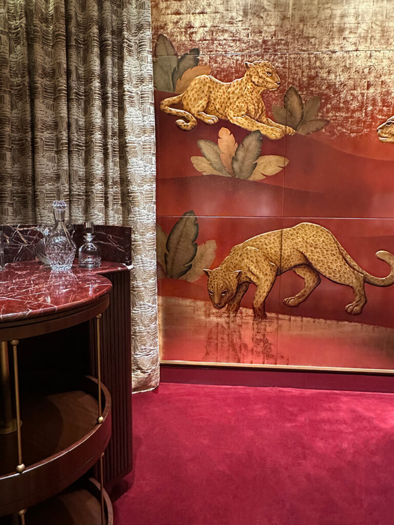Private office with red carpet inside a historic mansion interior