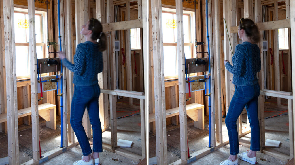 South Shore interior designer Sarah Scales on site during construction, overseeing new construction home design at the beach.