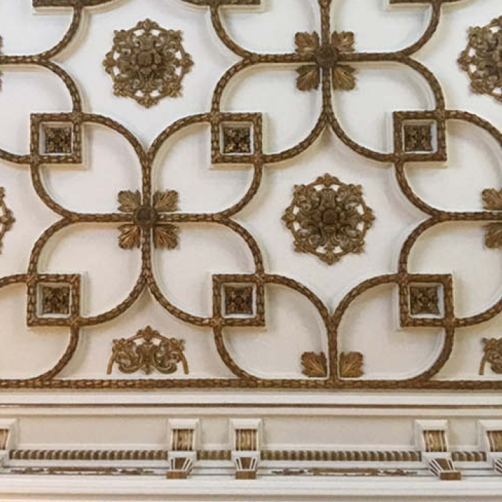 Gilded ceiling treatment with ornate architectural details at the historic Flagler Mansion, inspiring timeless design and craftsmanship.