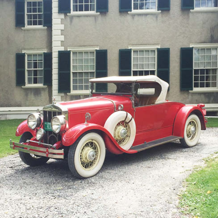 Vintage car at the Hildene Estate in northern Vermont, inspiring architectural and design ideas with classic elegance and historic charm.